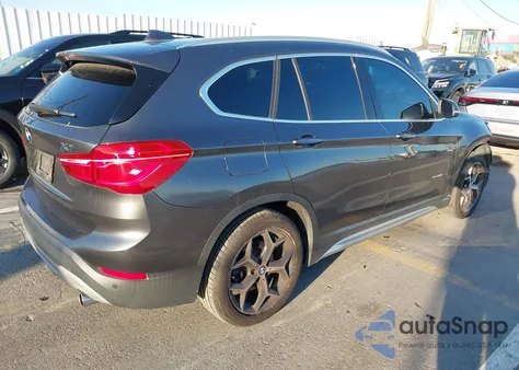 2018 BMW X1 xDrive28I z USA, uszkodzony, nr VIN WBXHT3C33J5F89654